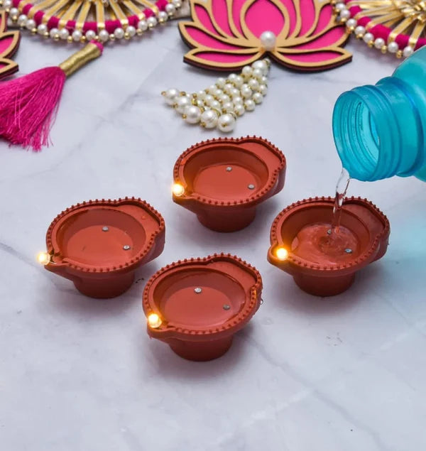 Twinkle your Diwali with our magical Water Sensor LED Diya!